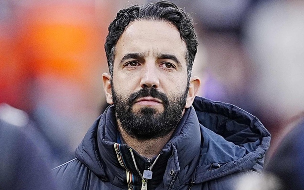 Determine the compensation amount MU pays to Coach Amorim