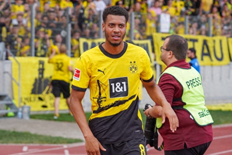 BVB's savvy business approach prices Emre Can at €70 million, with two Premier League Big 6 clubs showing interest.