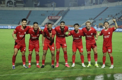 Southeast Asian fans react in unison as the Vietnamese team lands in the Asian 'group of death'