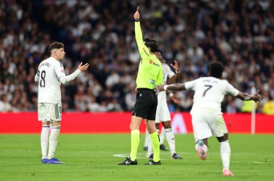 Student receives red card, Real Madrid coach praises referee